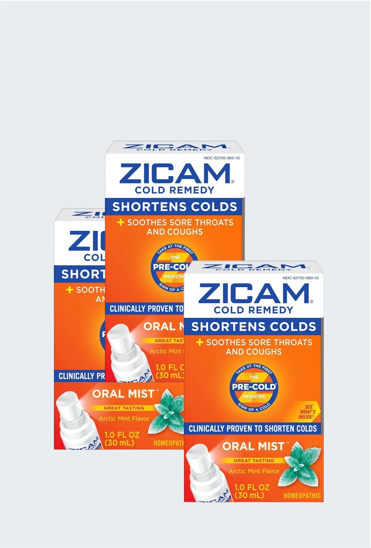 Three pack Zicam cold remedy products including tablets and oral mist on a light gray background